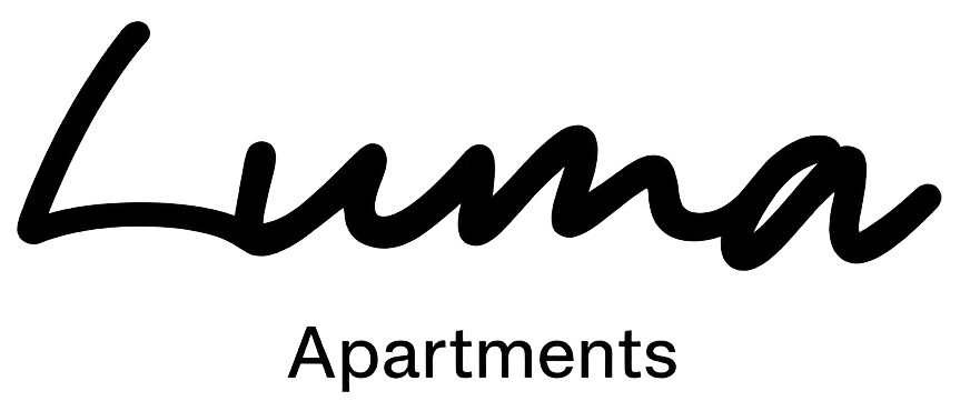 The image is of a script text saying 'Luma' and beneath it in a regular font is the word 'apartments' These are in a dark blue black-colour. It is the logo for the Luma development in Ollerton which has up to 12% projected gross yields, 5% Deposit Payment Plans, 3 year service pack and a first year 1% rent booster. This makes it a great purchase for local people and overseas investors alike.